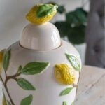 Artekko Lemon Εκρού Κεραμικό Βάζο Δοχείο με Καπάκι και Λεμόνια (22x22x37.5)cm