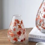 Artekko Aphelios Διάφανο Γυάλινο Βάζο με Πορτοκαλί Λουλούδια (12.5x12.5x18)cm