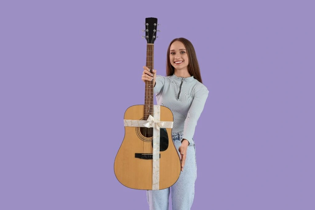 Μουσικός με δώρο κιθάρα 