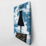 Πινακας σε καμβά BLACK DRESSED WOMAN ON TOP OF ROCKS RETRO DREAMSCAPE