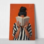 Πίνακας σε Καμβά AFROCENTRIC WOMAN HIDING BEHIND BOOK ORANGE