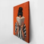 Πίνακας σε Καμβά AFROCENTRIC WOMAN HIDING BEHIND BOOK ORANGE