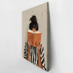 Πίνακας σε Καμβά AFROCENTRIC WOMAN HIDING BEHIND BOOK WHITE