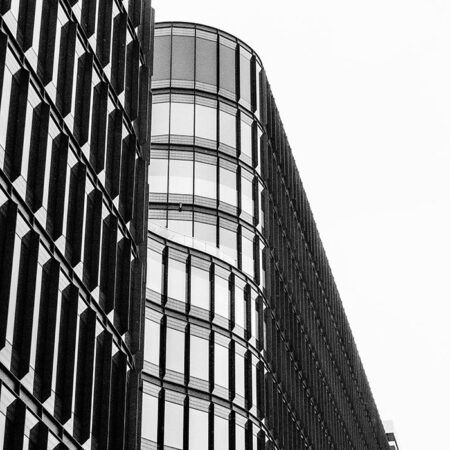 Πίνακας σε Καμβά BLACK AND WHITE ARCHITECTURAL MODERN GLASS BUILDING - Πολεις και Αρχιτεκτονικη Sticky 5