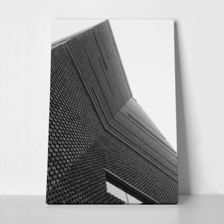 Πίνακας σε Καμβά BLACK AND WHITE ARCHITECTURAL PIERCED BRICK FACADE - Πολεις και Αρχιτεκτονικη