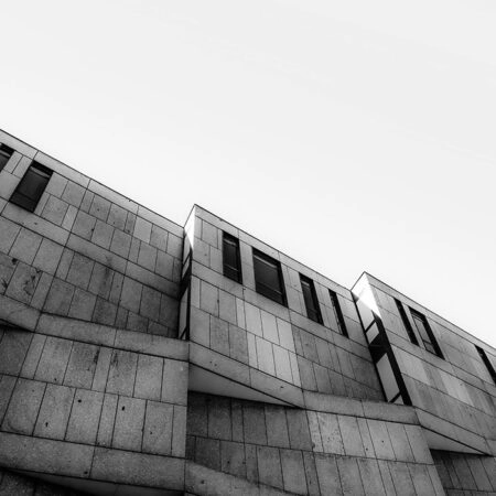 Πίνακας σε Καμβά BLACK AND WHITE ARCHITECTURAL TEXTURED CONCRETE BUILDING - Πολεις και Αρχιτεκτονικη Sticky 5