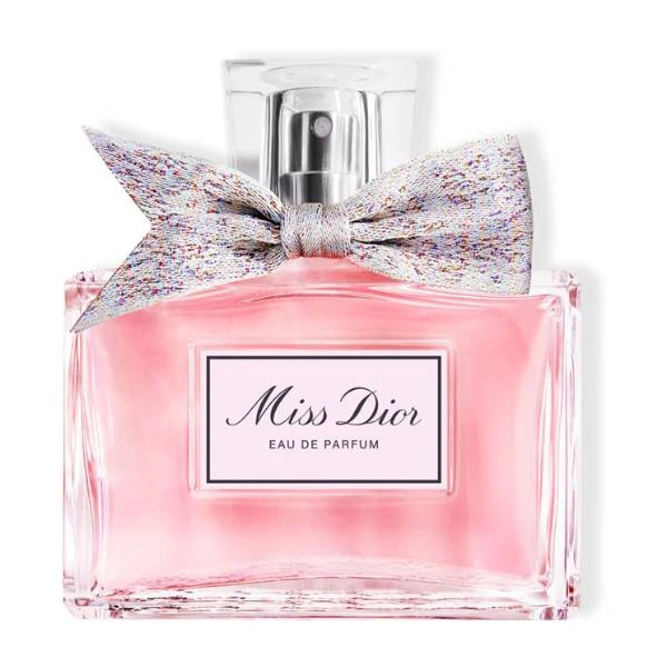 Μπουκάλι ροζ αρώματος Miss Dior Eau de Parfum με υφασμάτινο φιόγκο σε λευκό φόντο.
        loading=